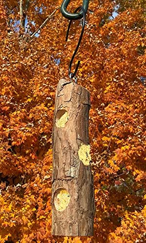 cedar suet log feeder by prime retreat shown in use