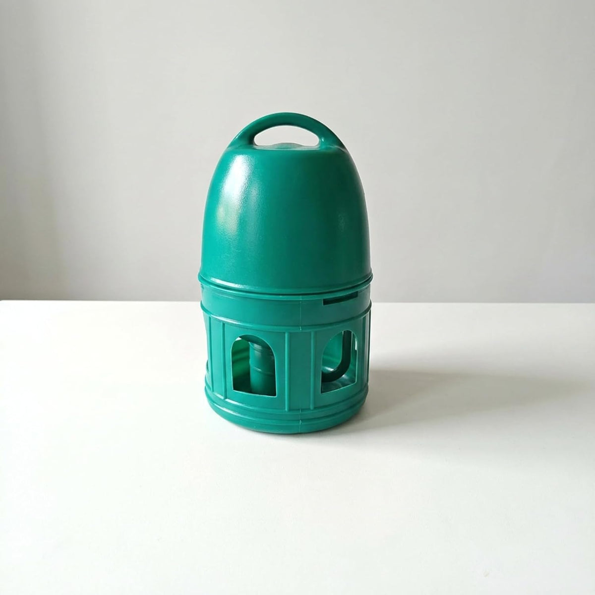 pigeon drinker pigeon water dispenser plastic drinker bird shown in use