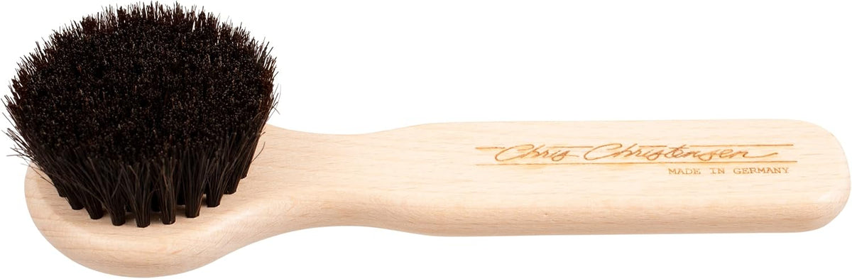 chris christensen horse hair chalk brush for dogs shown in use