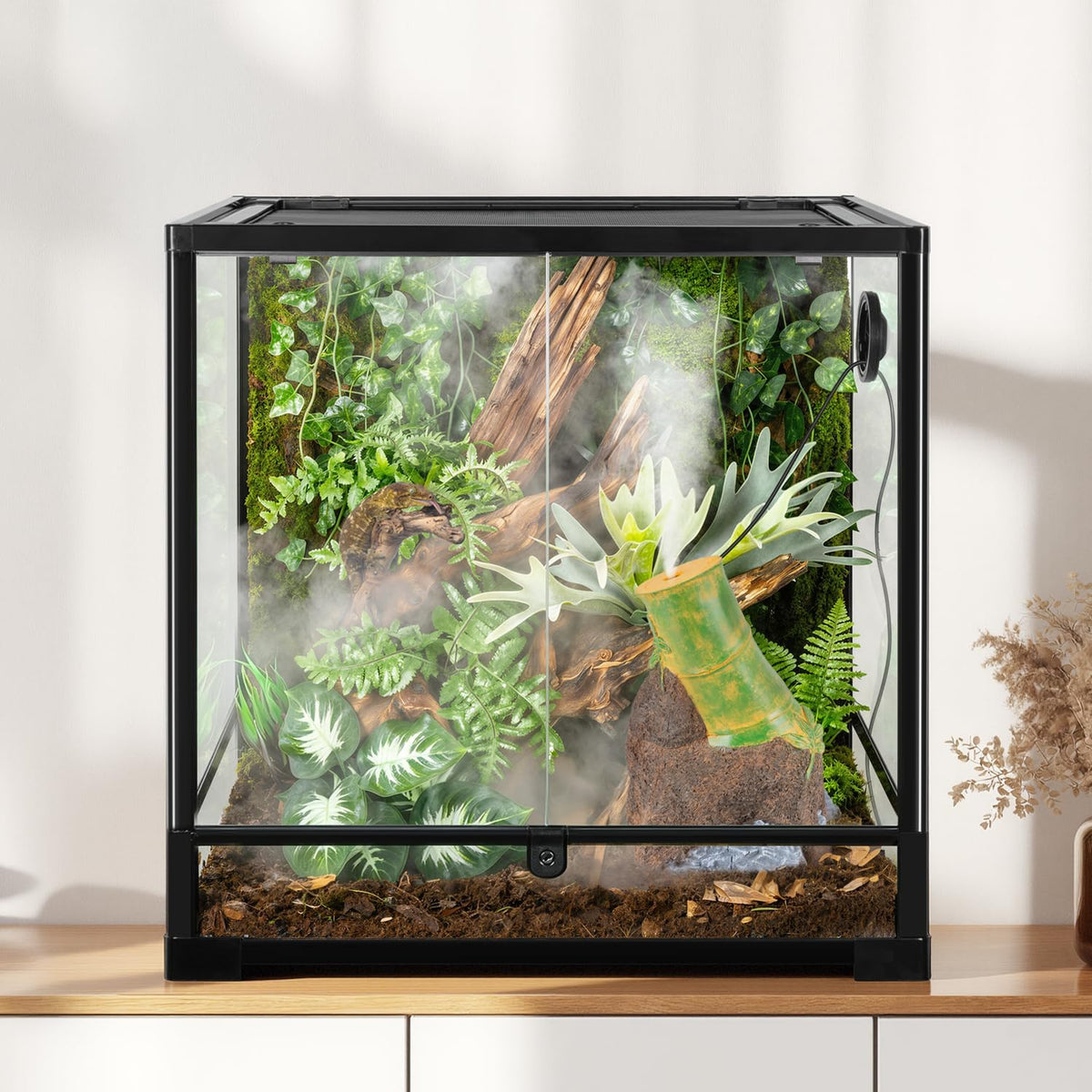 reptile humidifier fogger, bamboo trunk humidifier with top on a desk or shelf
