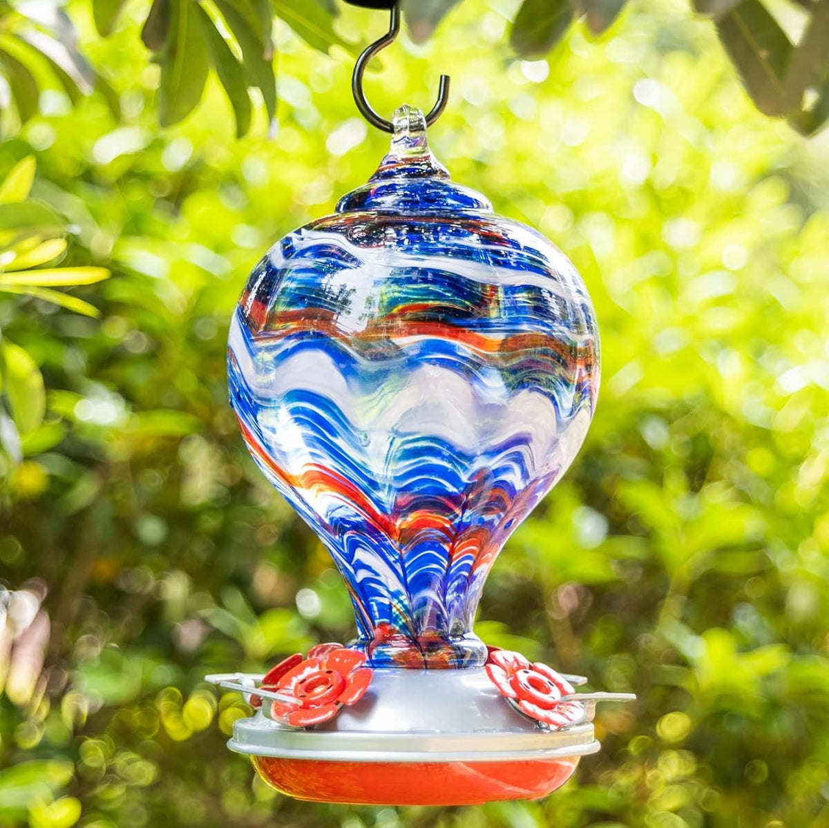 muse garden 32oz hummingbird feeders blown glass hummingbird shown in use