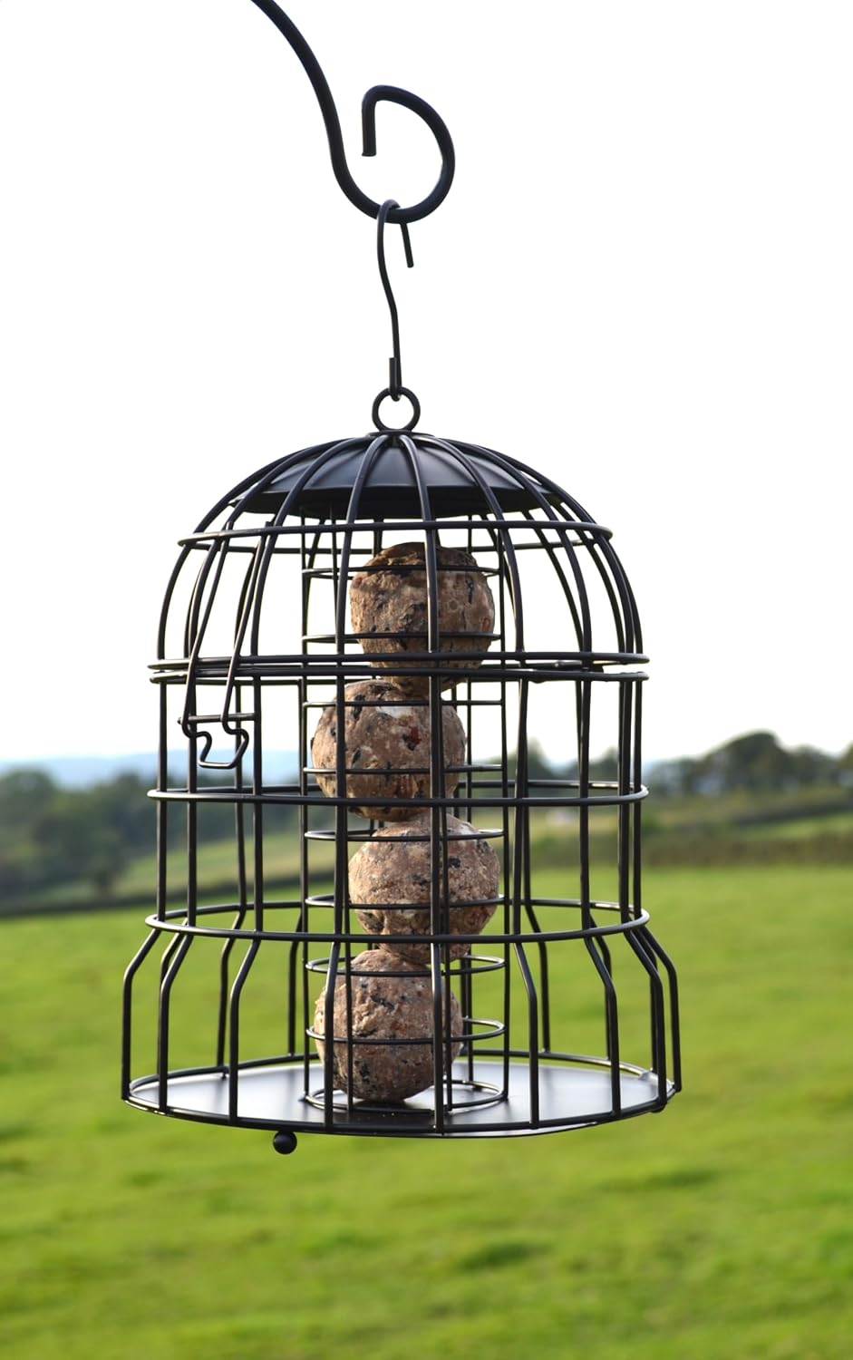 supa premium wild bird cage fat ball feeder shown in use