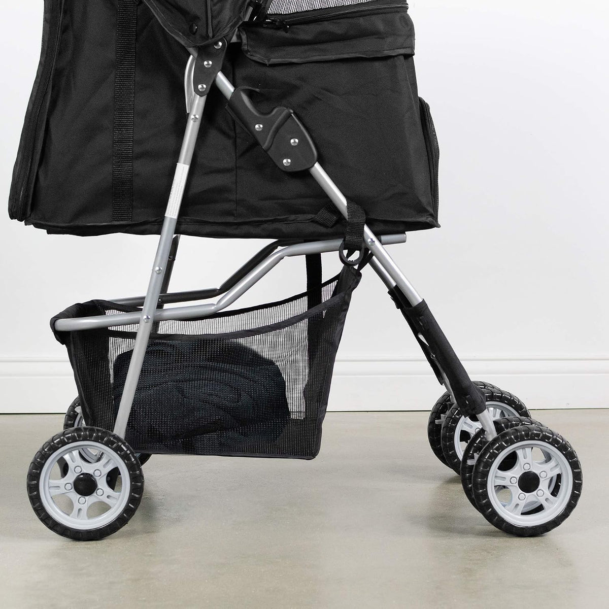 vivo black 4 wheel pet stroller for cat on a desk or shelf