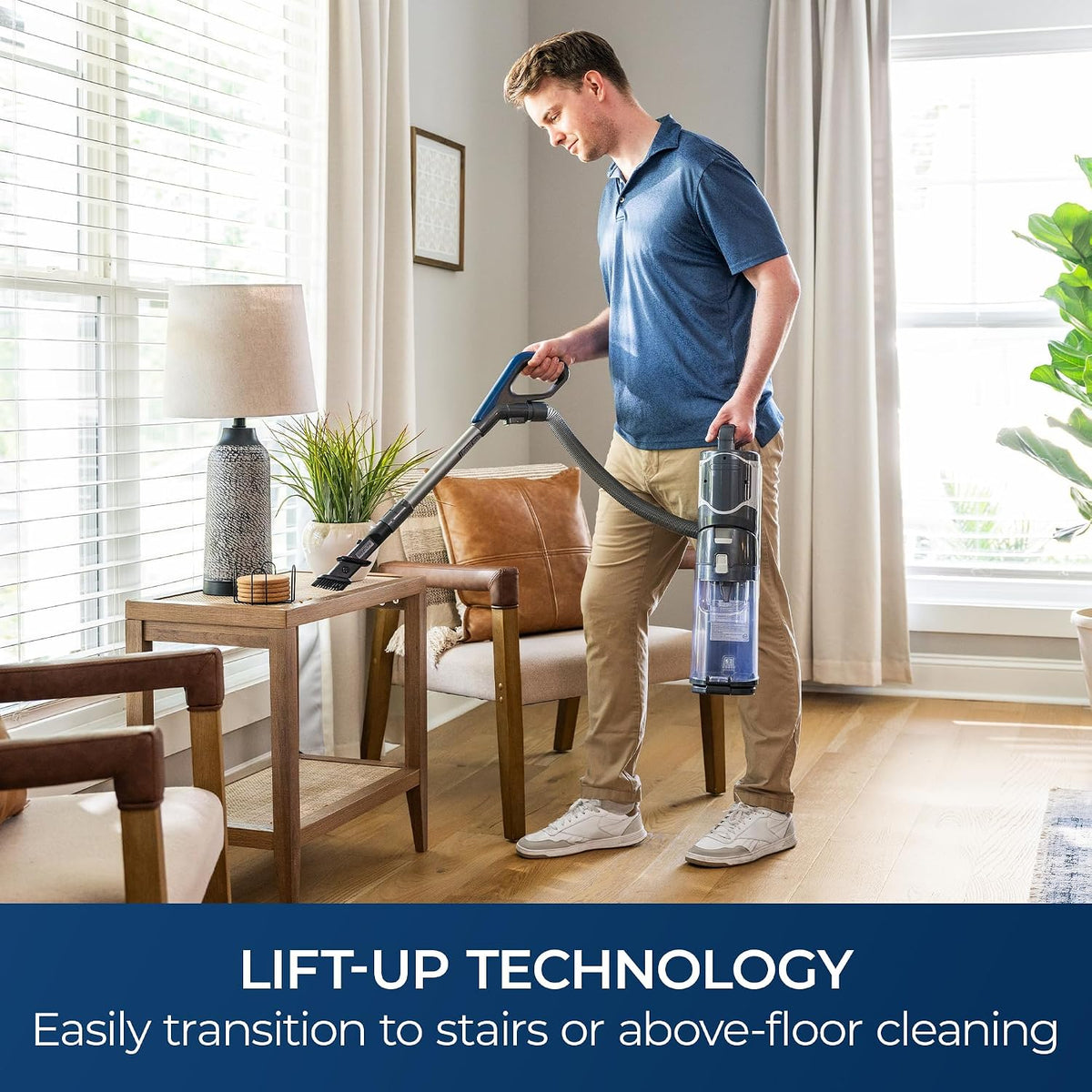 kenmore litening cordless upright vacuum with hair eliminator shown in use