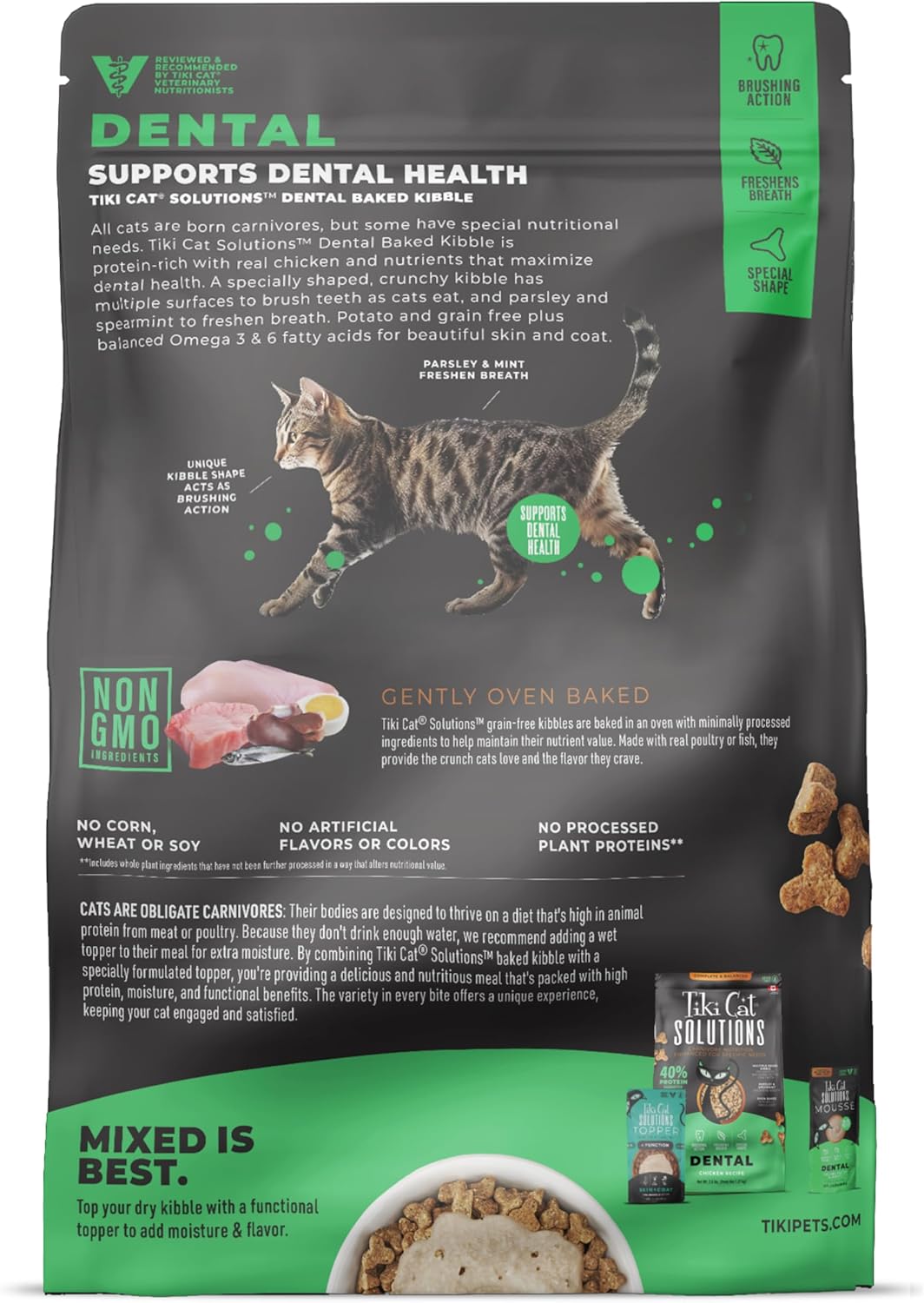 tiki cat solutions dry cat food, dental, chicken. shown in use