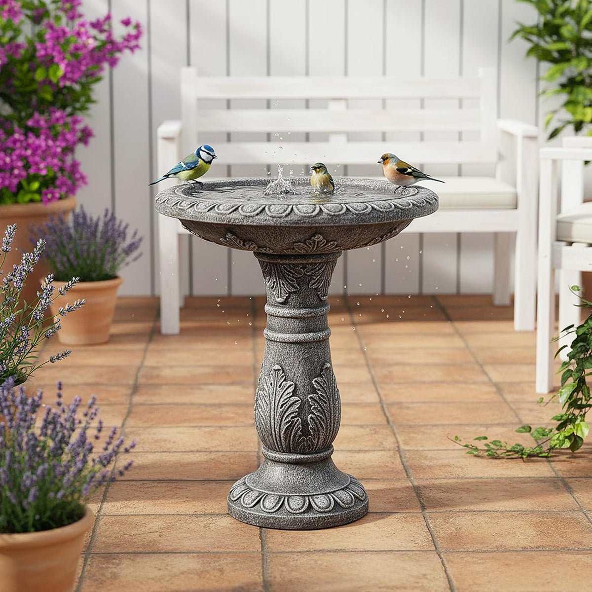skyfire 24.4" h cement bird bath for garden shown in use