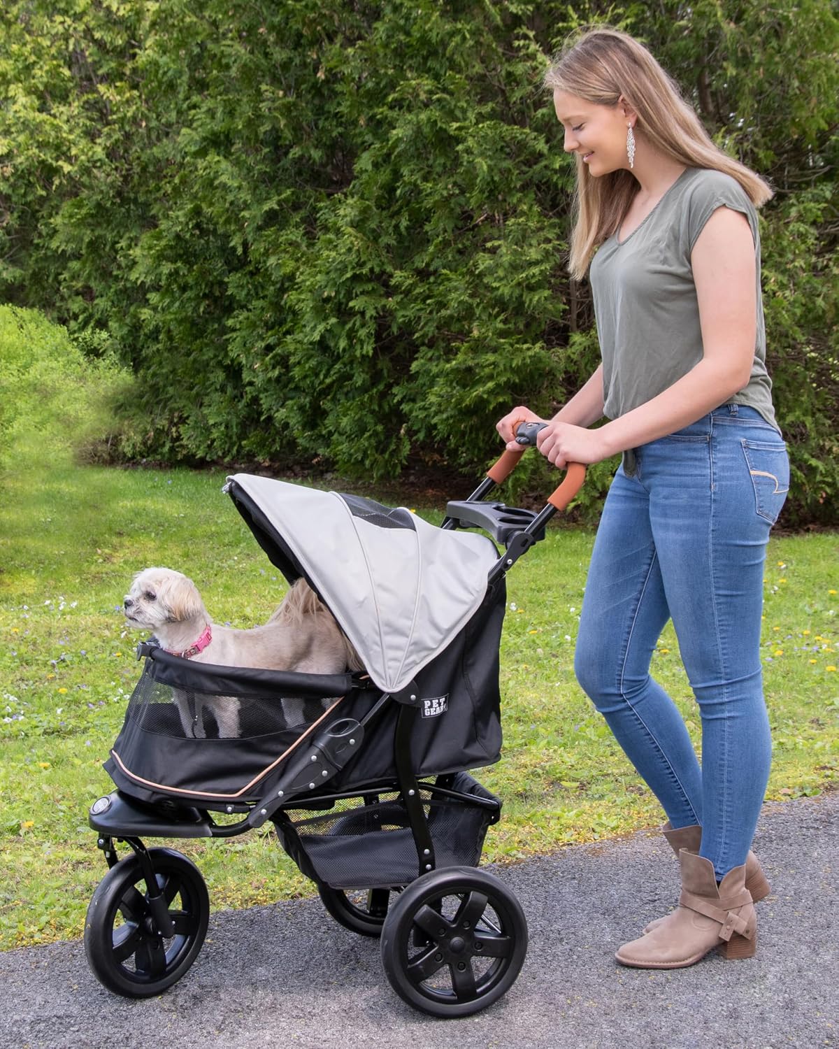 pet gear no-zip at3 pet stroller for cats/dogs shown in use