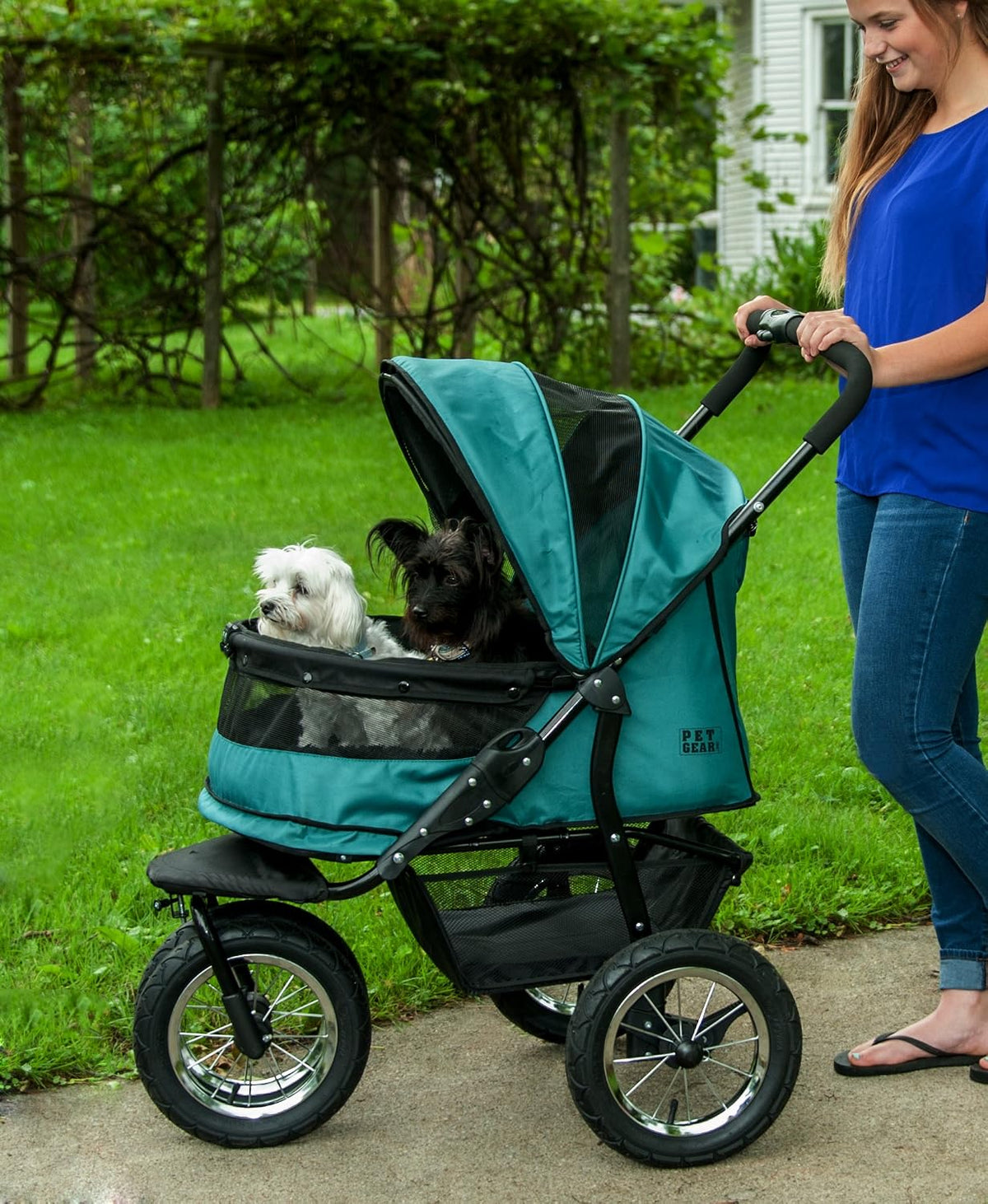 pet gear no-zip double pet stroller, zipperless entry shown in use