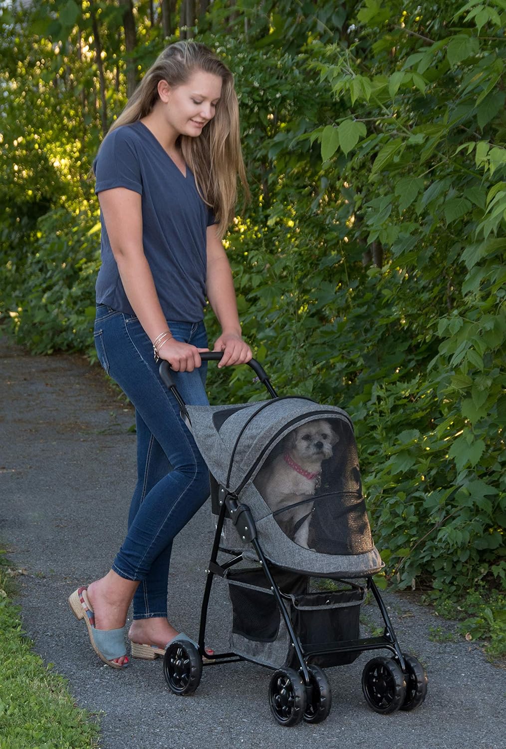 pet gear no-zip happy trails lite pet stroller shown in use