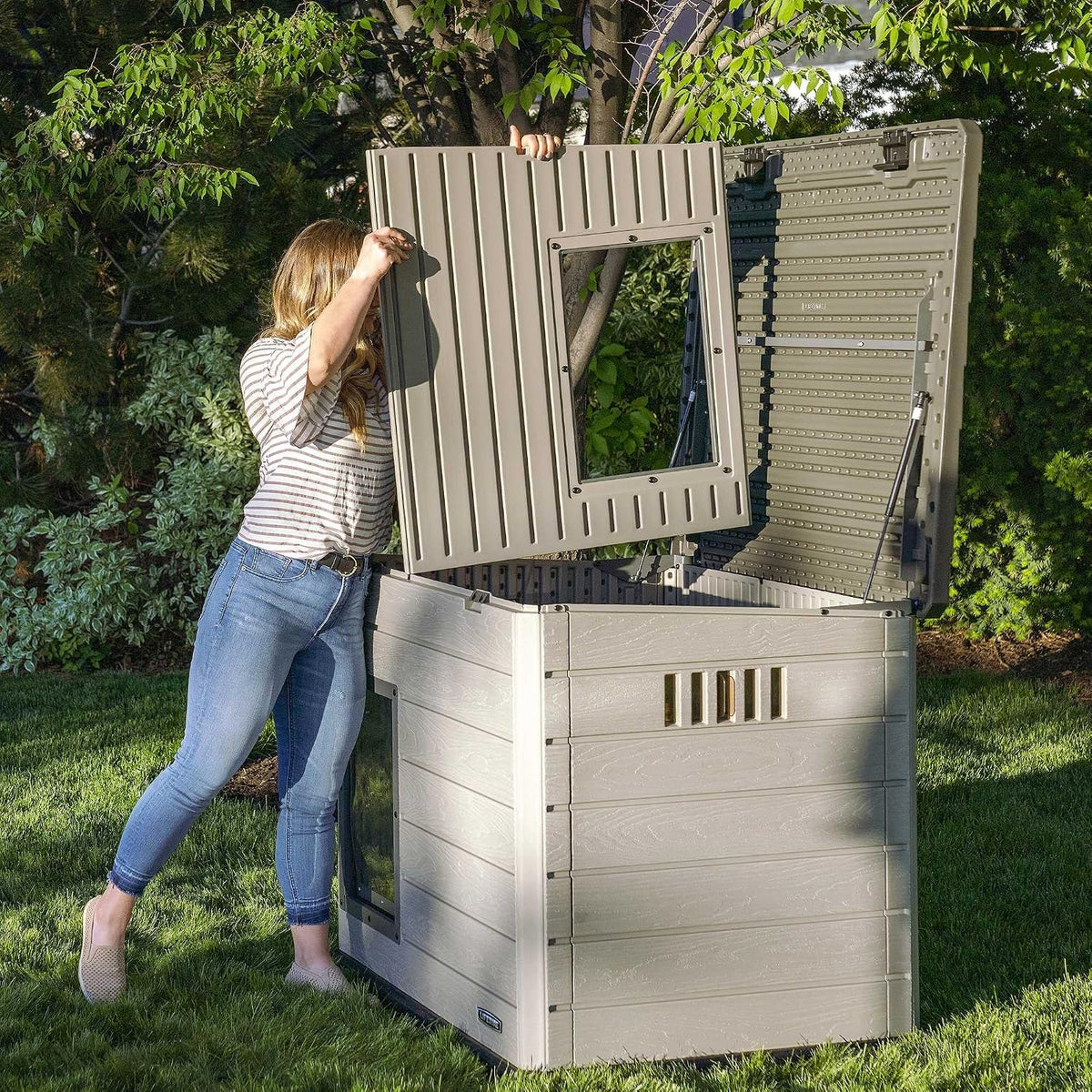 lifetime deluxe dog house, weather protected with adjustable, front angle view